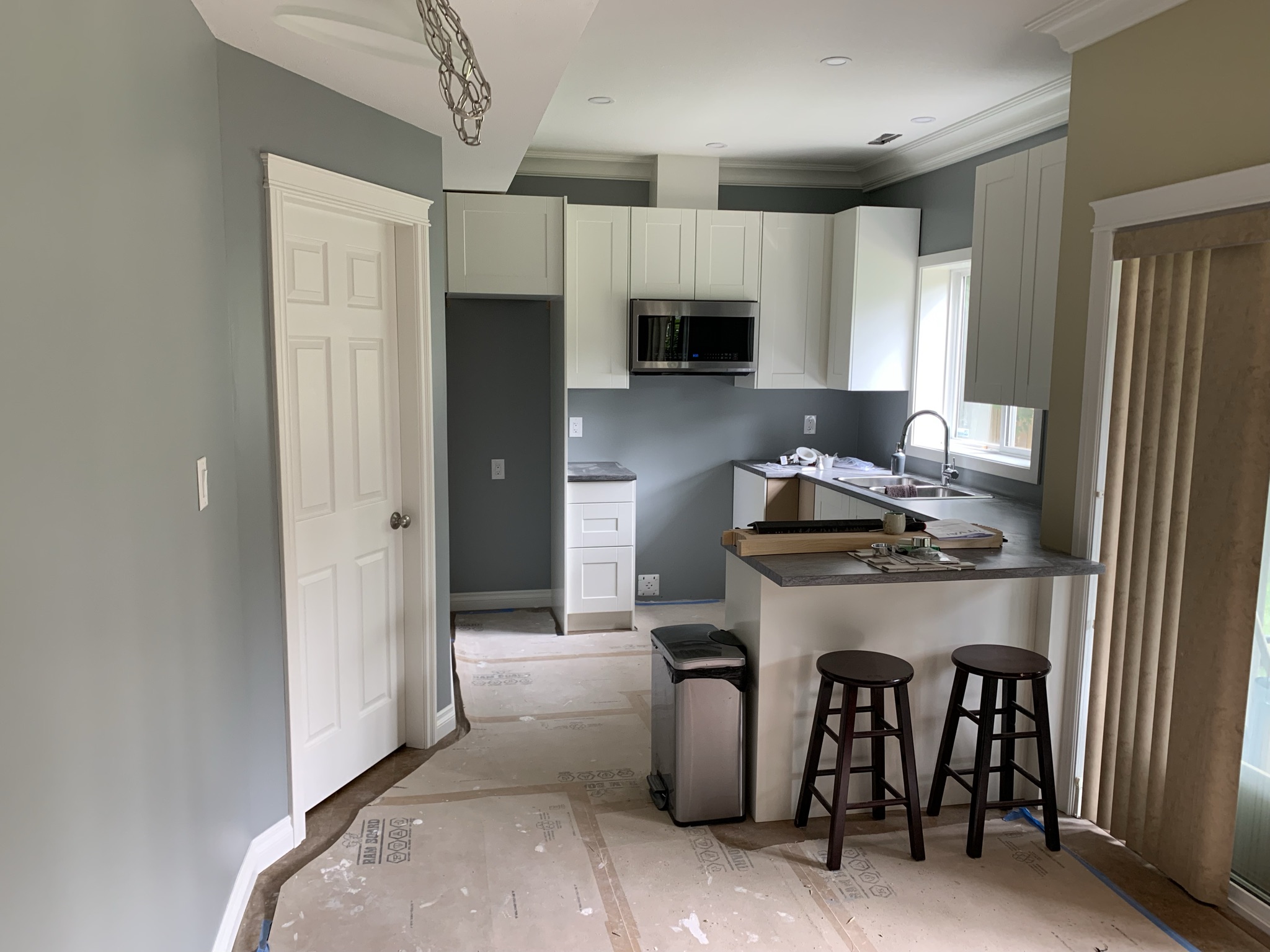 Freshly painted kitchen with crisp white trim and cabinets